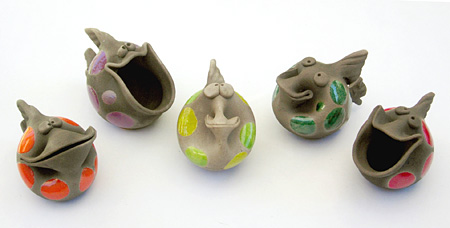 Overhead view of five raku sitting fish